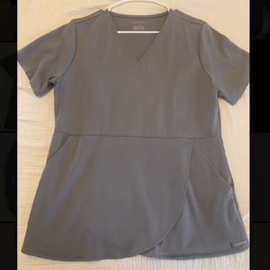 Scrub Top. Jaanuu Women’s Mock Wrap Tulip Top, size L. Color Gray